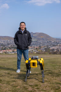 Wang with the new robot