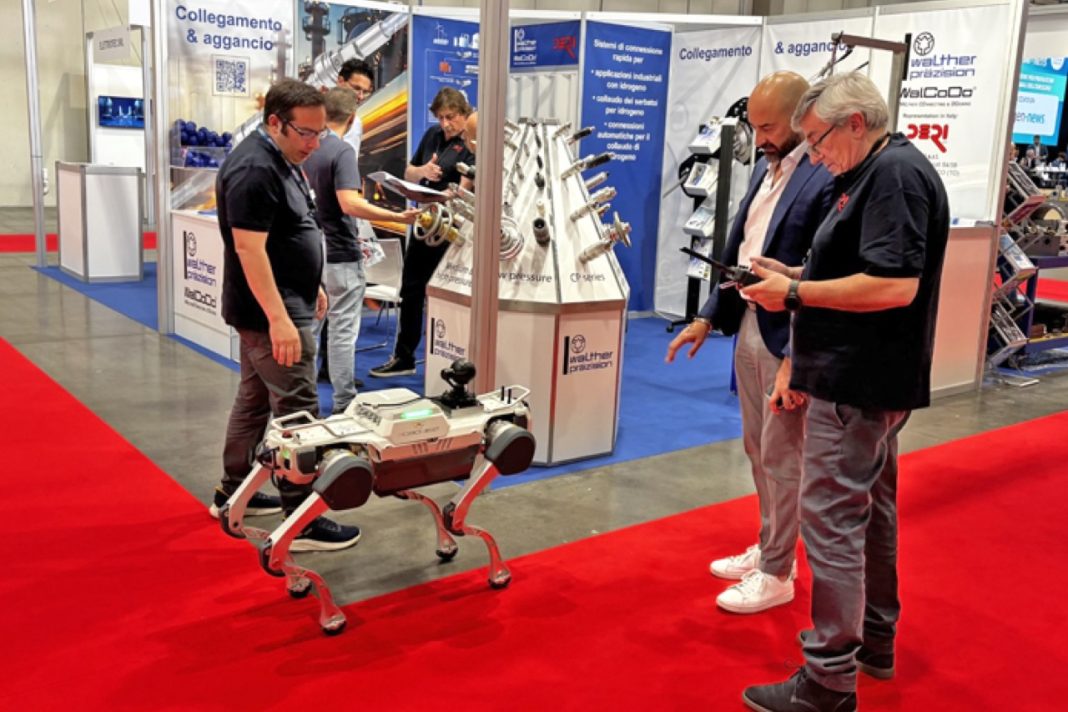 Automated guided vehicles and autonomous mobile robots operating in a modern warehouse logistics environment at AGV Expo 2026
