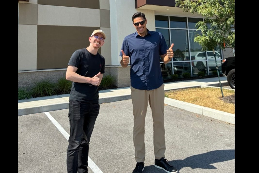 Daniel Ackroyd and Giovanni Cespedes standing outside Accu's new US headquarters in Indiana