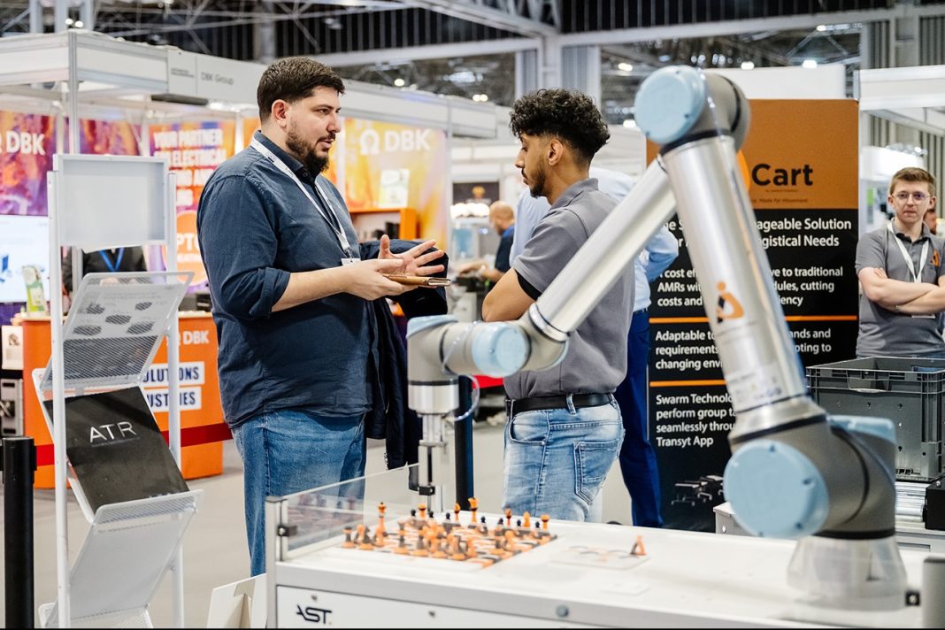 Engineers and visitors exploring innovation displays at Advanced Engineering 2026 exhibition at NEC Birmingham