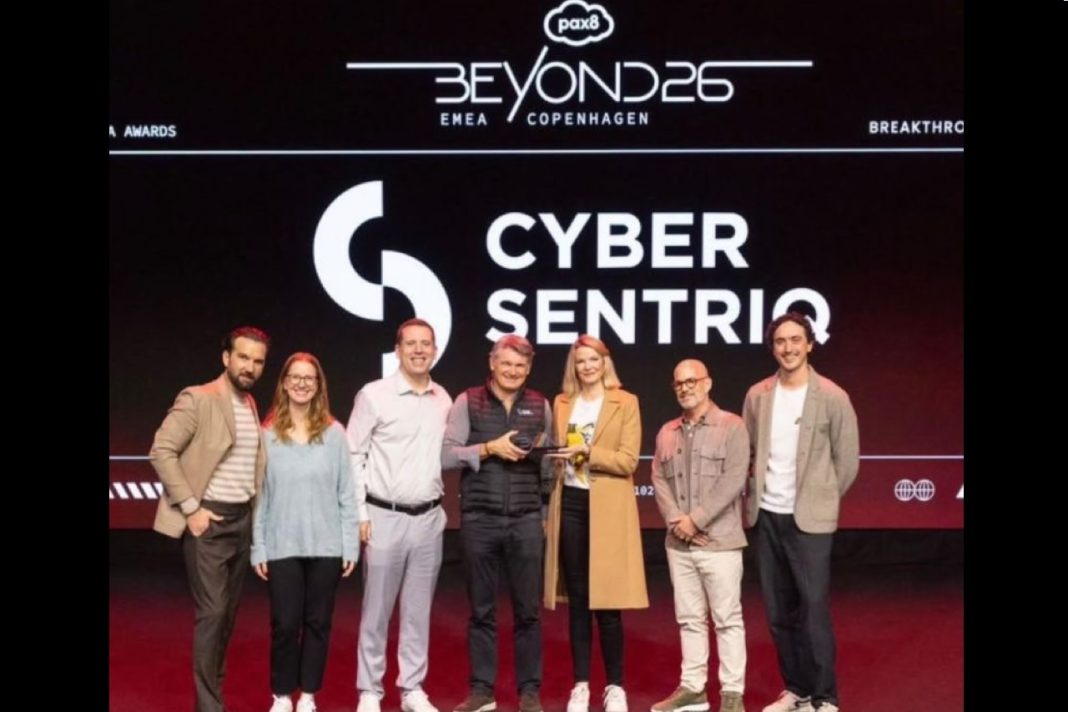 CyberSentriq CEO Myles Bray and VP of Channel Heidi Coerlin accepting the EMEA Breakthrough Vendor award at Pax8 Beyond EMEA 2026 in Copenhagen