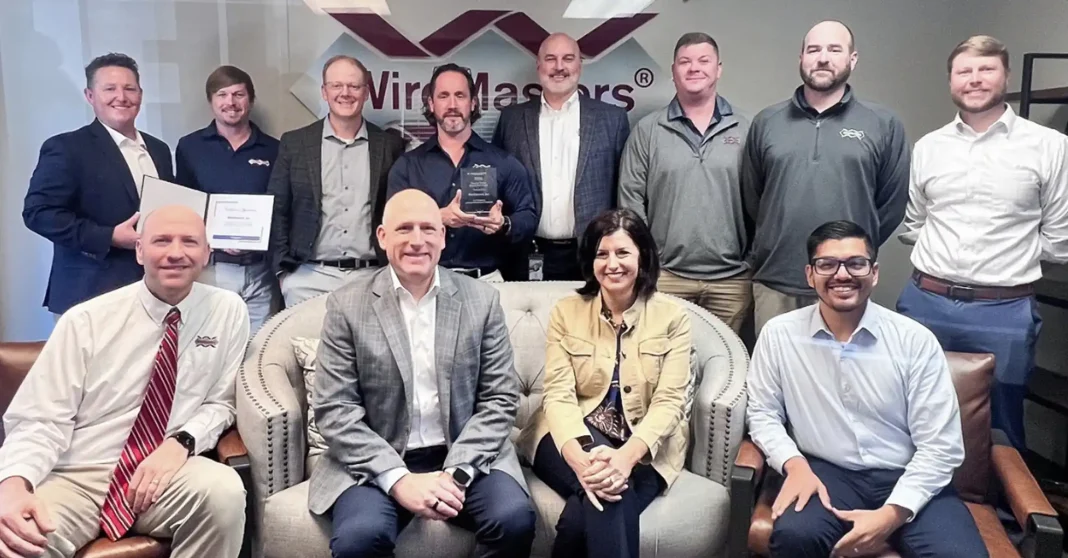 WireMasters representative receiving the General Atomics Aeronautical Systems Supplier Quality Award for aerospace wire and cable excellence